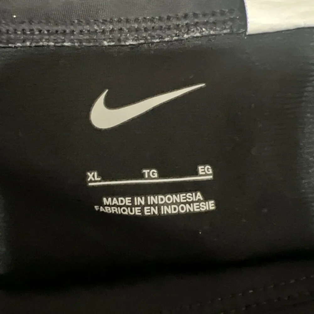 Women's Nike Athletic Running & Jogging Mesh Shorts Black Solid Logo Regular